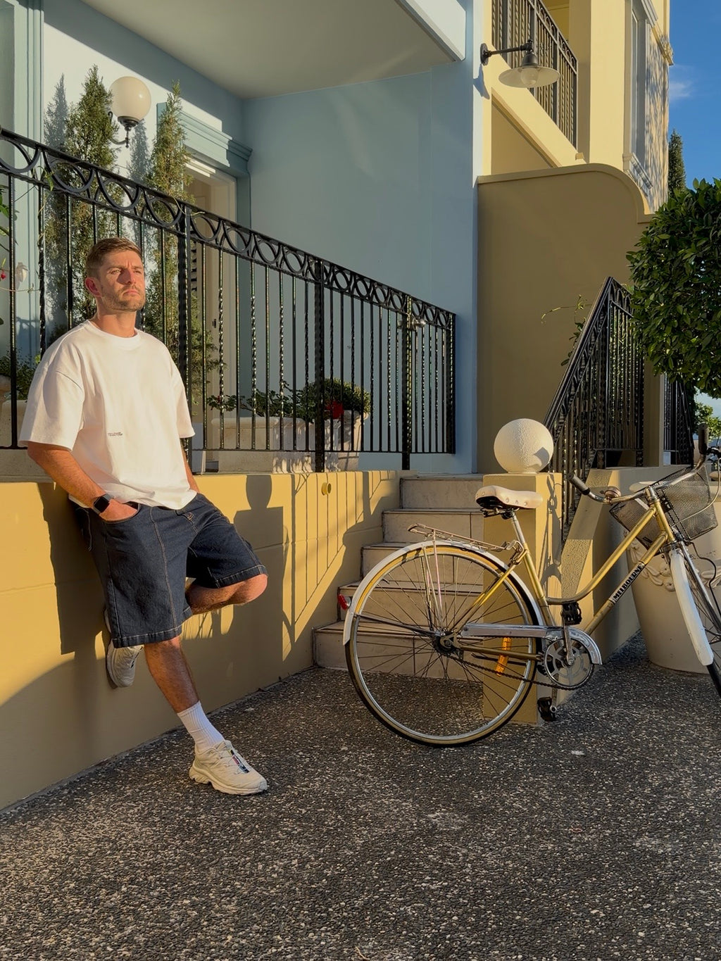 Telos Rae Box Tee in white, relaxed lifestyle shot