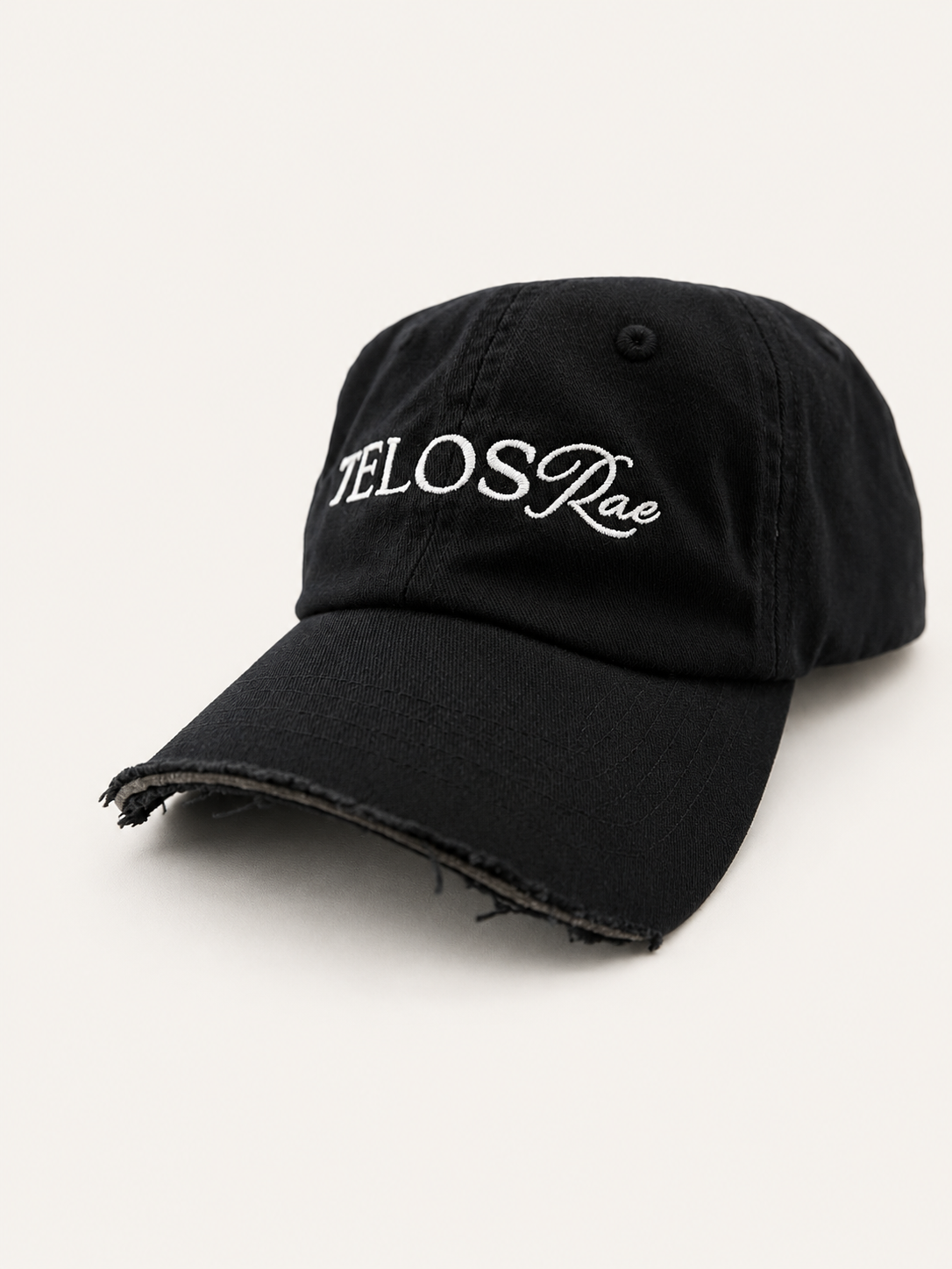 Telos Rae Dad Hat in black with cut brim