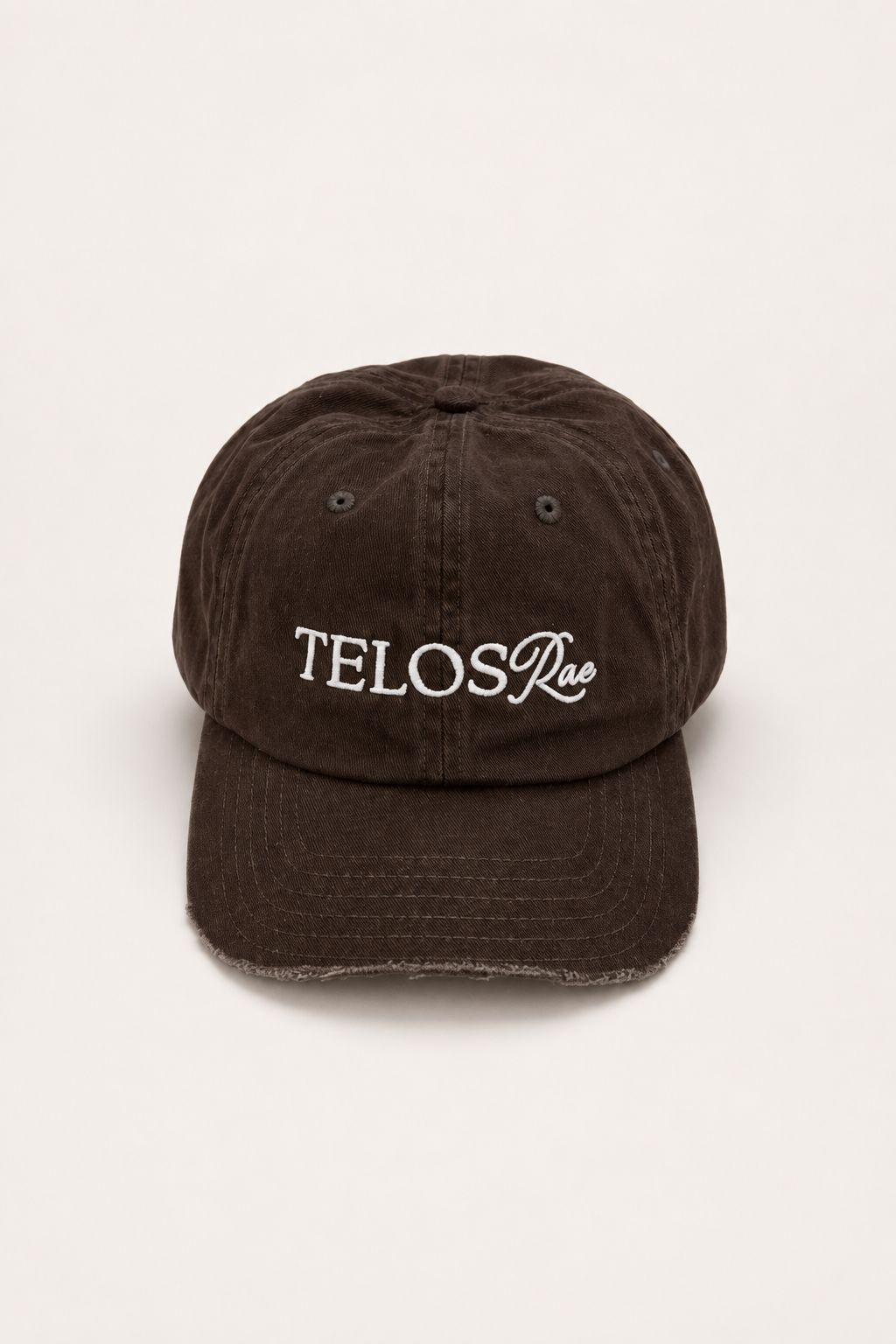 Telos Rae Dad Hat in brown with cut brim, front view